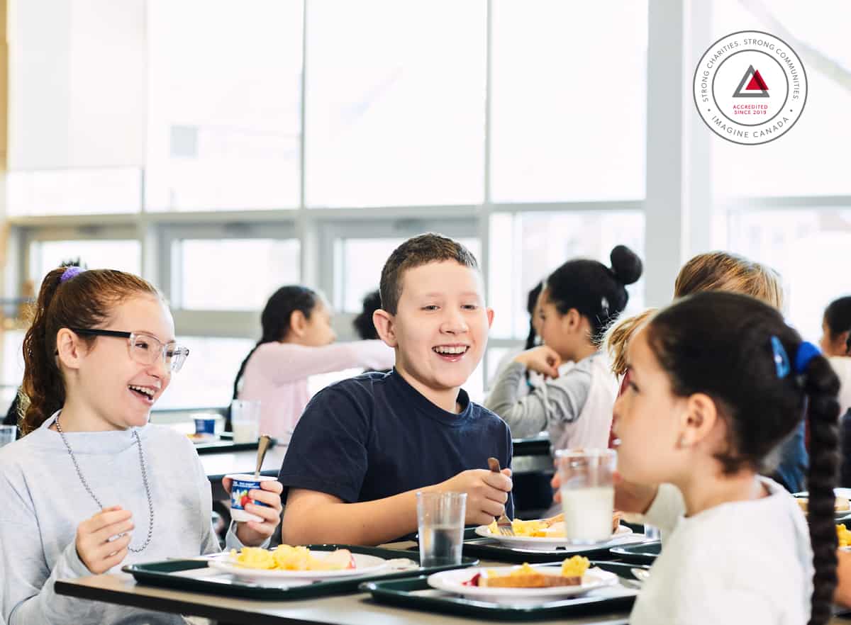 children laughing in cafeteria
