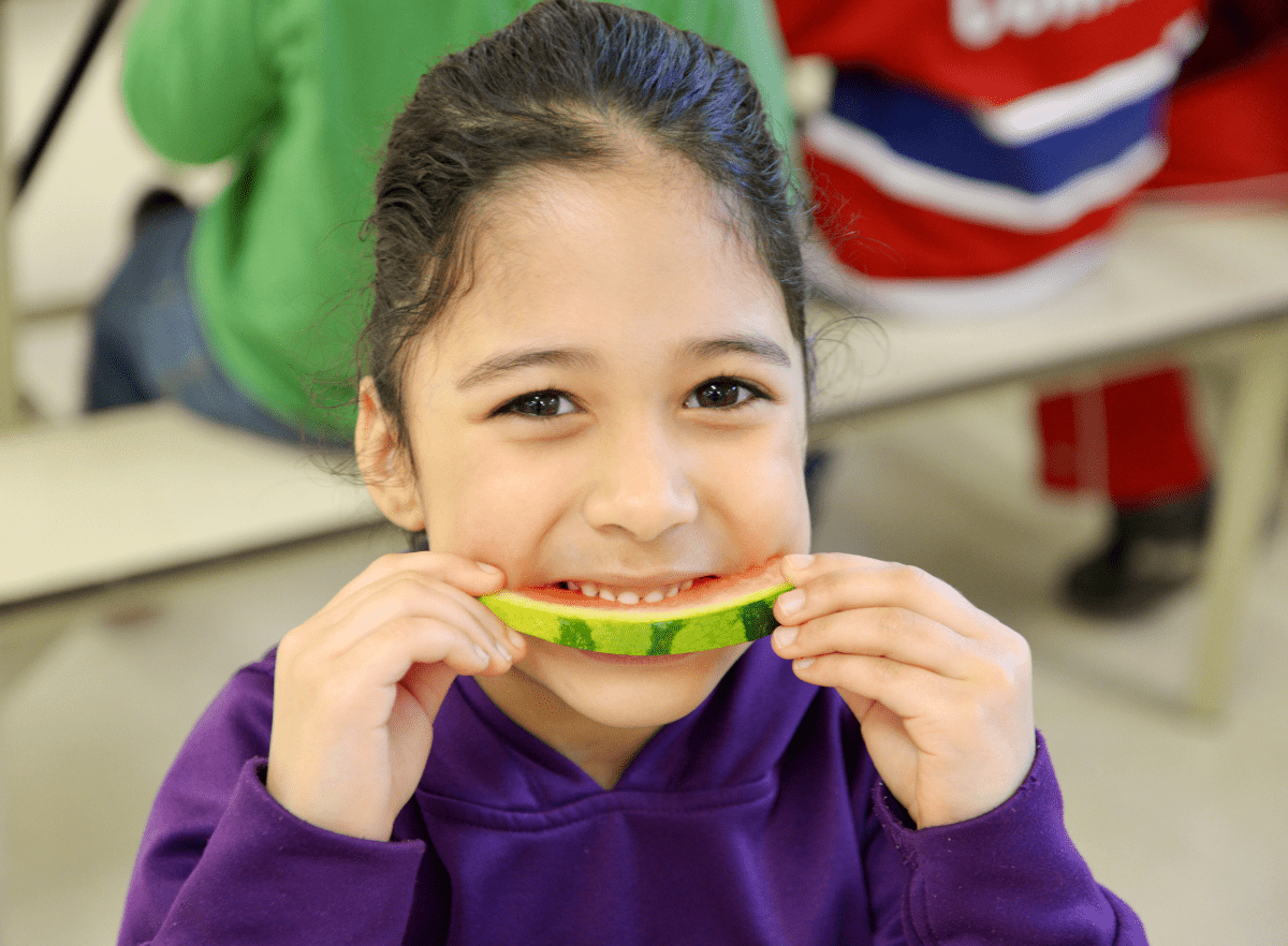 girl eating watermelon